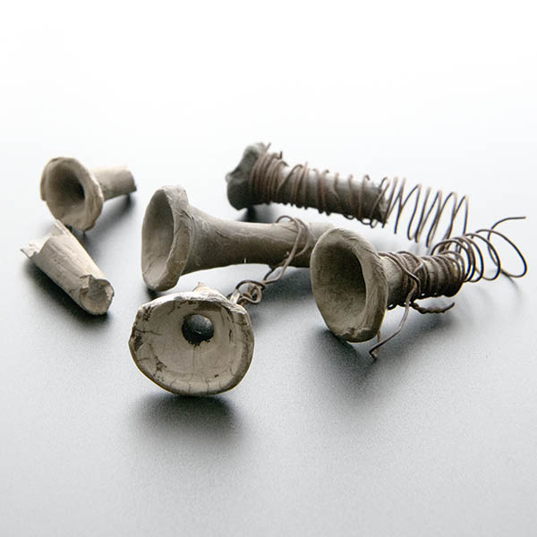 Broken raku fired ceramic bottle tops